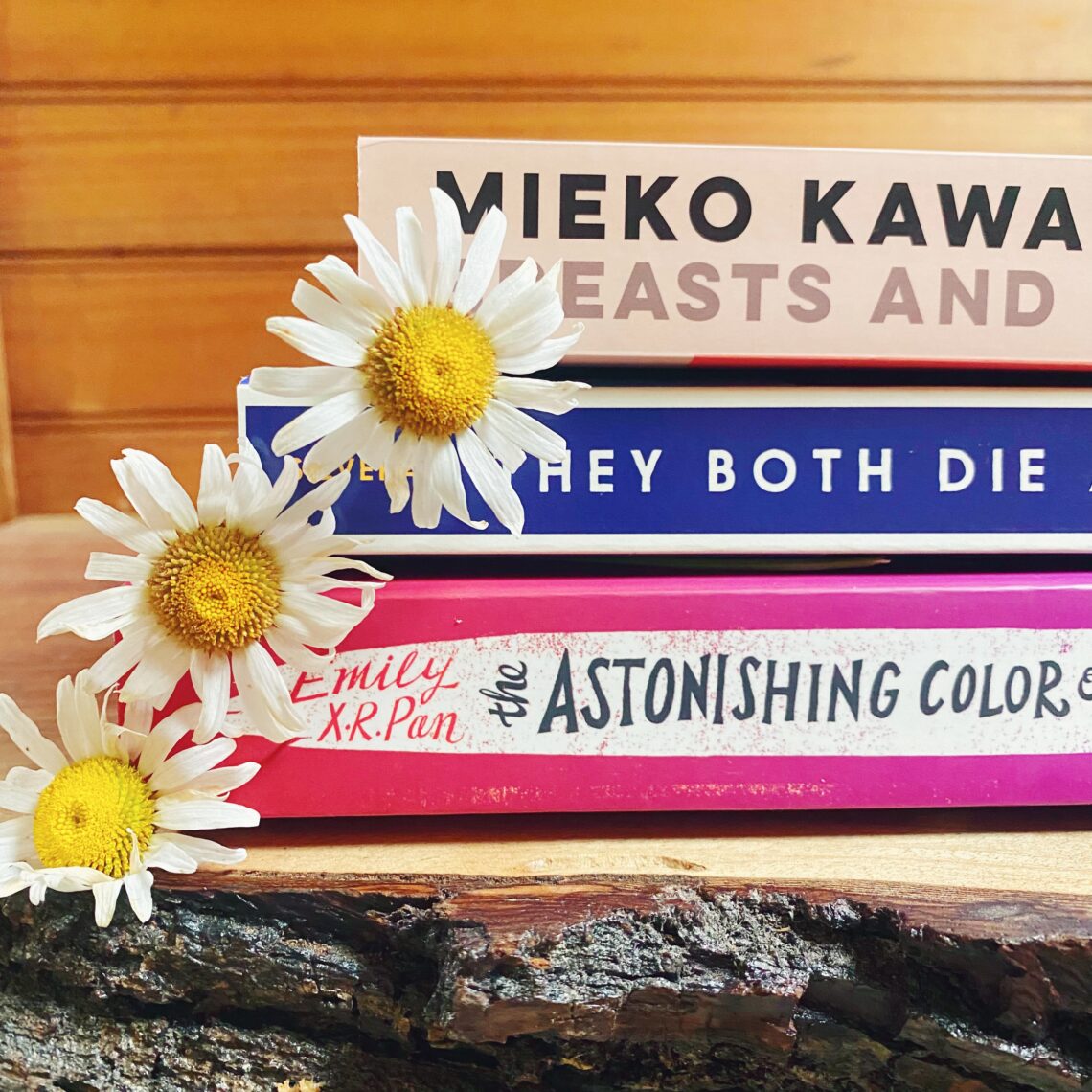 Stack of Books with Daisies
