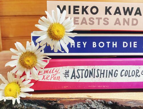Stack of Books with Daisies