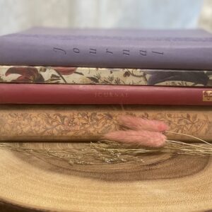 Stack of four journals