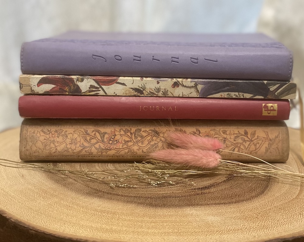 Stack of four journals
